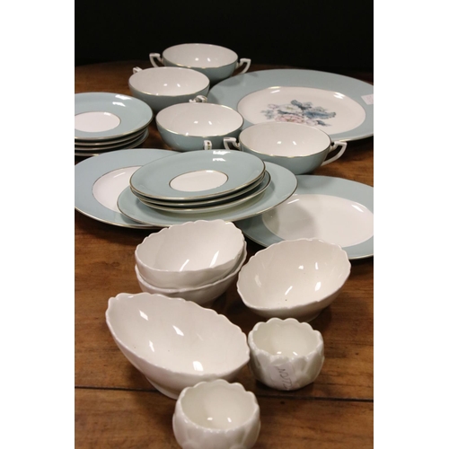 566 - A contemporary Royal Worcester Cynthia part dinner service.