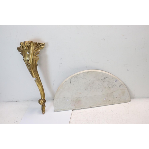 641a - Scrolling Gilt Wood Console Table Leg together with a Demi-Lune Marble Top, 89cms wide