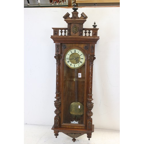 521 - A antique Vienna style drop dial twin train movement wall clock with brass weights.