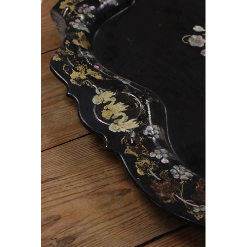 397 - Two antique papier mache lacquer pieces to include a fan and a tray (A/F).
Part of an extensive coll... 