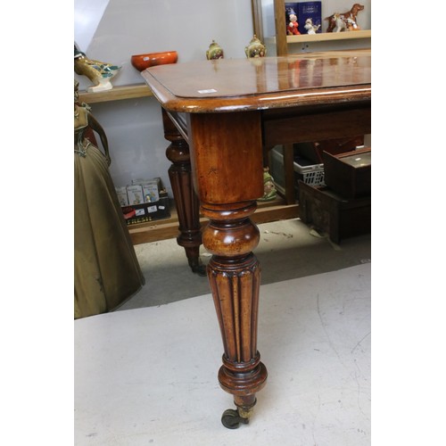 654 - 19th century Mahogany Extending Dining Table, with two additional leaves, raised on turned and flute... 