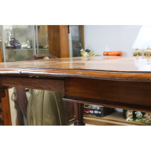 654 - 19th century Mahogany Extending Dining Table, with two additional leaves, raised on turned and flute... 