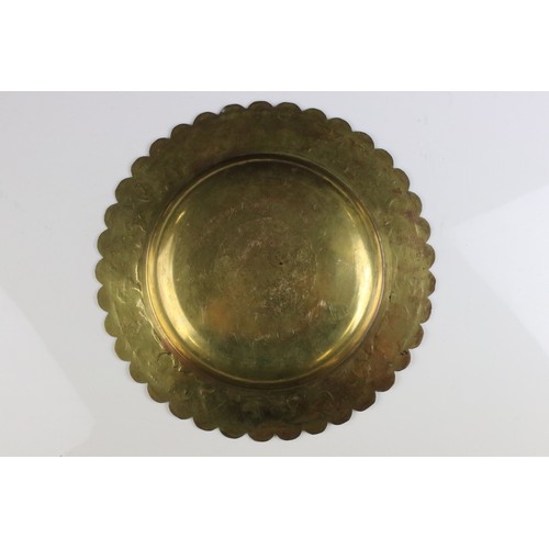 79 - An arts and Crafts early 20th century brass dish with stylized etched decoration to edge dated 1912 ... 