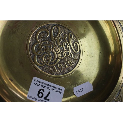 79 - An arts and Crafts early 20th century brass dish with stylized etched decoration to edge dated 1912 ... 