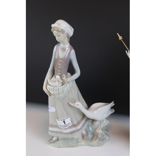 1 - Two Lladro Figurines including Girl with Geese, 31cms high and a Lady with Parasol (a/f)