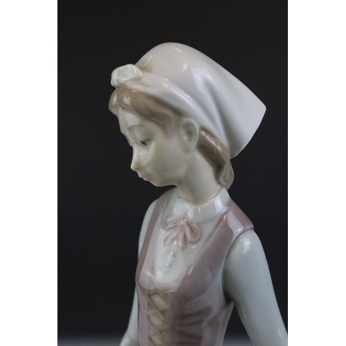 1 - Two Lladro Figurines including Girl with Geese, 31cms high and a Lady with Parasol (a/f)