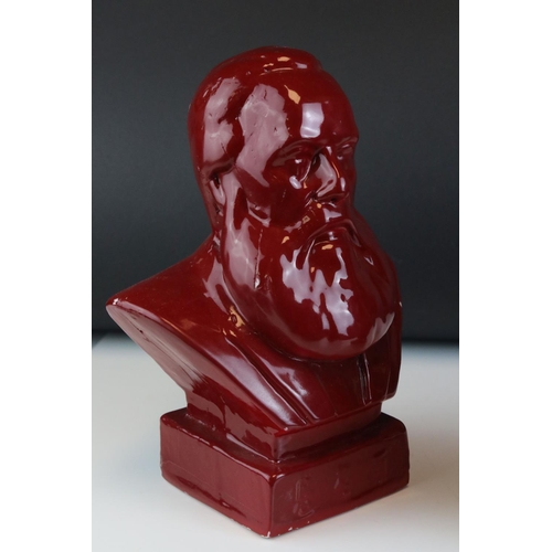 16 - Two Red Glazed Ceramic Busts of Stalin and Marx, 27cms high