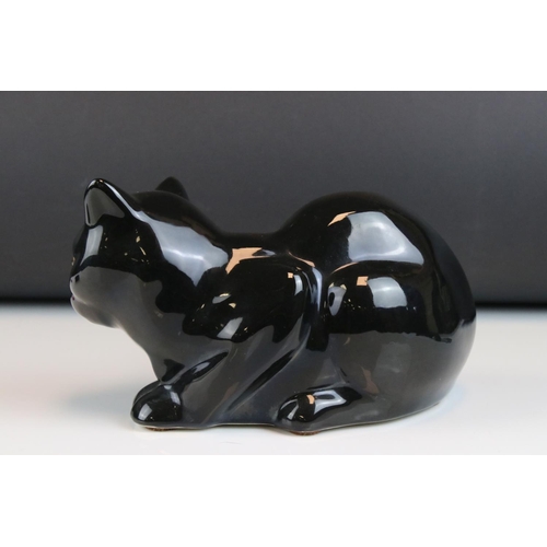 5 - French Emaux de Longwy Pottery Black Cat, stamped to base ' Faienceries de Longwy ', 24cms long