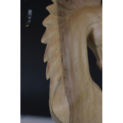 55 - Carved wooden sculpture of a horse's head