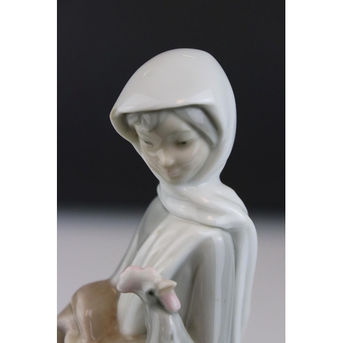 7 - Two Lladro Figurines - Girl holding Lamb, 29cms high and Girl holding Chicken and Basket (a/f), 25cm... 