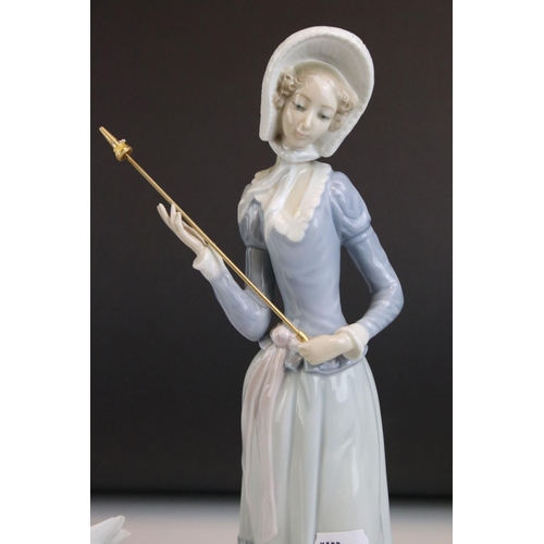 1 - Two Lladro Figurines including Girl with Geese, 31cms high and a Lady with Parasol (a/f)