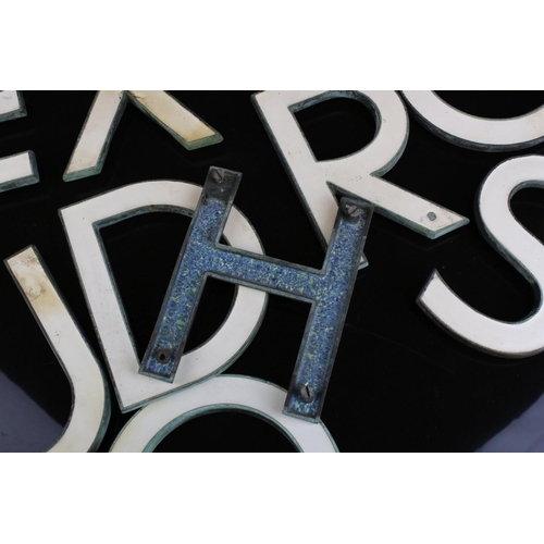 33 - Eleven Mid 20th century Enamel Metal Letters spelling ' Oxford House ', each 16cms high