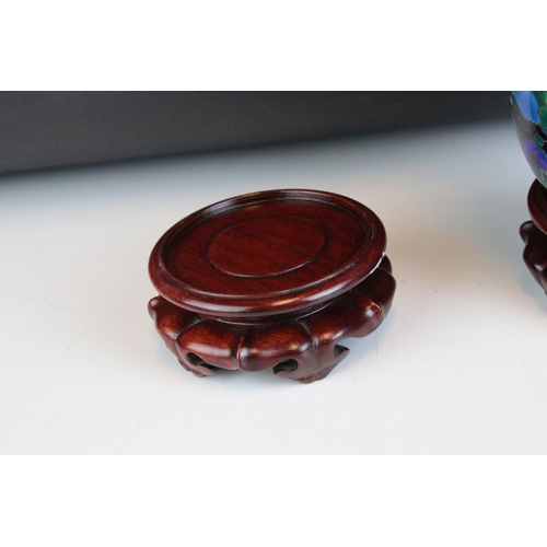 48 - Pair of Cloisonné Vases on Wooden Stands, 27cms high together with Three Lidded Cloisonné Containers... 