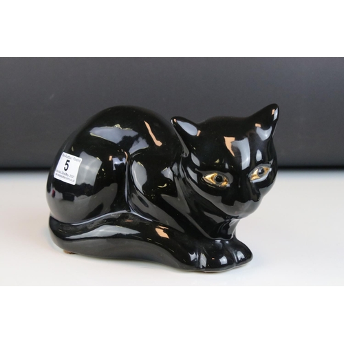 5 - French Emaux de Longwy Pottery Black Cat, stamped to base ' Faienceries de Longwy ', 24cms long