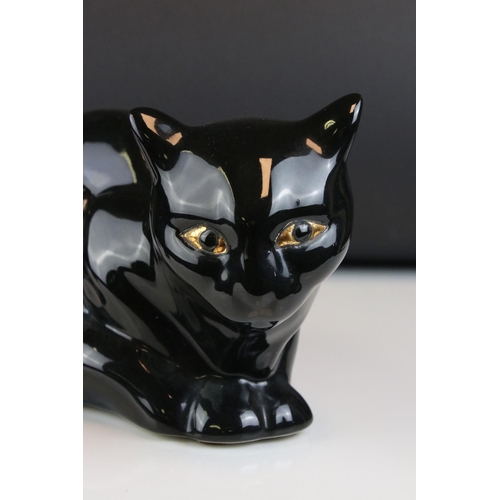 5 - French Emaux de Longwy Pottery Black Cat, stamped to base ' Faienceries de Longwy ', 24cms long