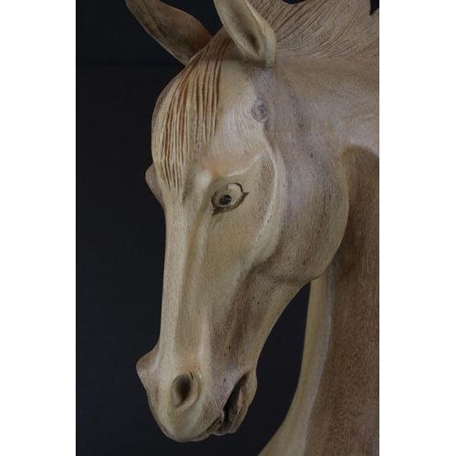 55 - Carved wooden sculpture of a horse's head