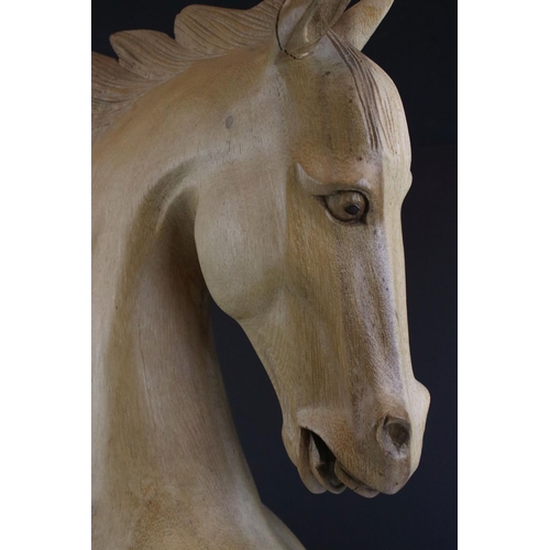 55 - Carved wooden sculpture of a horse's head