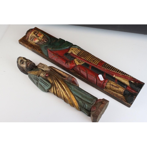 66 - Two decorative painted carved wooden figures.