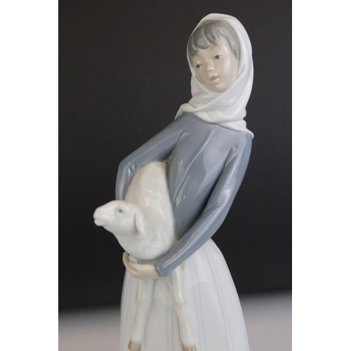 7 - Two Lladro Figurines - Girl holding Lamb, 29cms high and Girl holding Chicken and Basket (a/f), 25cm... 