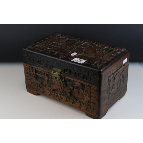 78 - A set of three oriental carved wooden graduated boxes.