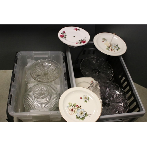 81A - A large collection of vintage glass and ceramic cake plates and cake stands.