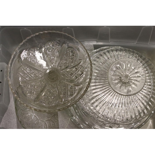 81A - A large collection of vintage glass and ceramic cake plates and cake stands.