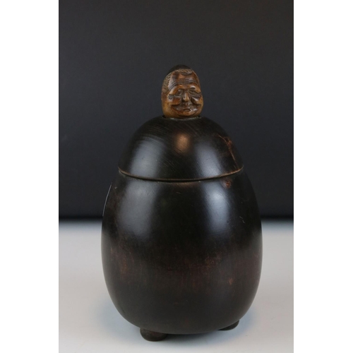 96 - Late 19th / Early 20th century Treen Tea Caddy / Box in the form of a Friar / Monk, raised on three ... 