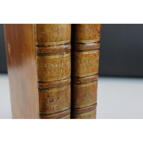 103 - Early 20th century double inkwell stand in the form of two leather bound antique books, 21cms wide