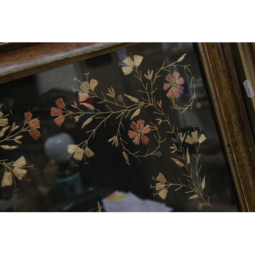 104 - 19th century Silk Needlework of H.M.S Blenheim bordered by floral sprays, 51cms x 41cms, framed and ... 