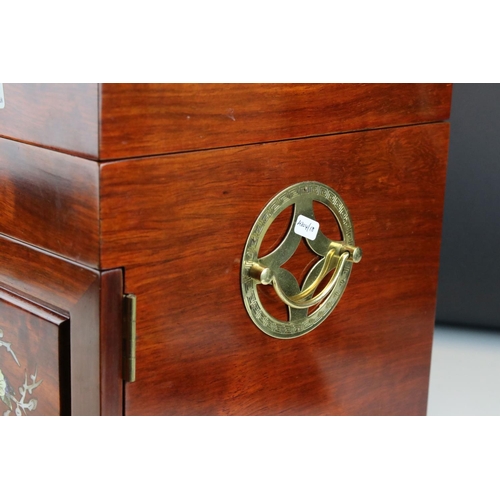 109 - Chinese mother-of-pearl jewellery box, inlaid with brass fittings, with top section and two doors re... 