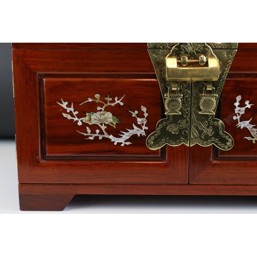 109 - Chinese mother-of-pearl jewellery box, inlaid with brass fittings, with top section and two doors re... 