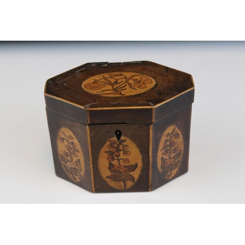 112 - A Georgian mahogany tea caddy with decorative floral panels, approx 11cm in height.