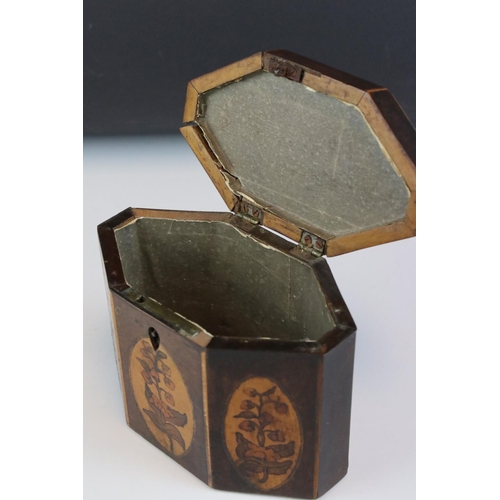 112 - A Georgian mahogany tea caddy with decorative floral panels, approx 11cm in height.