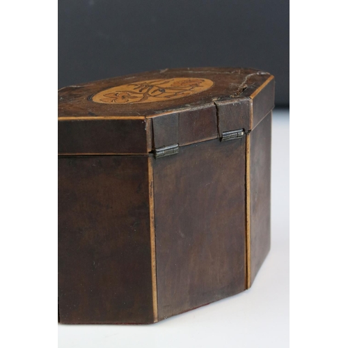 112 - A Georgian mahogany tea caddy with decorative floral panels, approx 11cm in height.