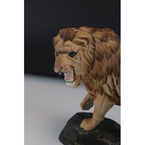 11 - Beswick Matt Lion on Rock, model no 2554A, 21.5cms high