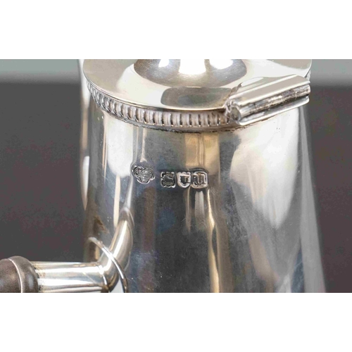 194 - A fully hallmarked sterling silver Chocolate pot, assay marked for London and dated for 1915.