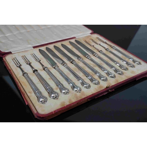 198 - A cased set of fully hallmarked silver handled knives and pickle forks, maker marked for Thomas Brad... 