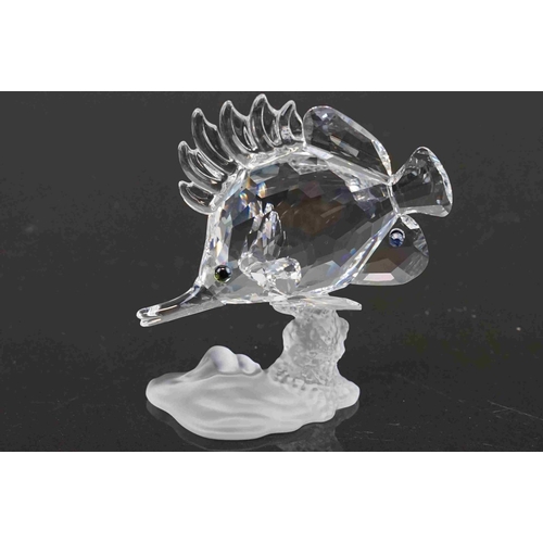 206 - A collection of three boxed Swarovski crystal ornaments to include puffer fish (A 7644), crab (A 765... 