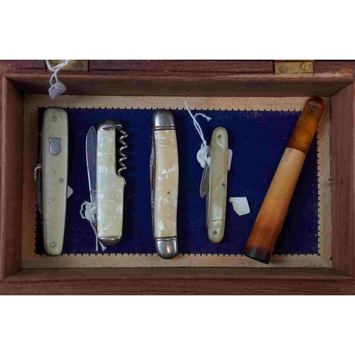 212 - A group of mixed collectables to include penknives, cheroot holder and a vintage fountain pen with 1... 