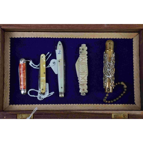 212 - A group of mixed collectables to include penknives, cheroot holder and a vintage fountain pen with 1... 