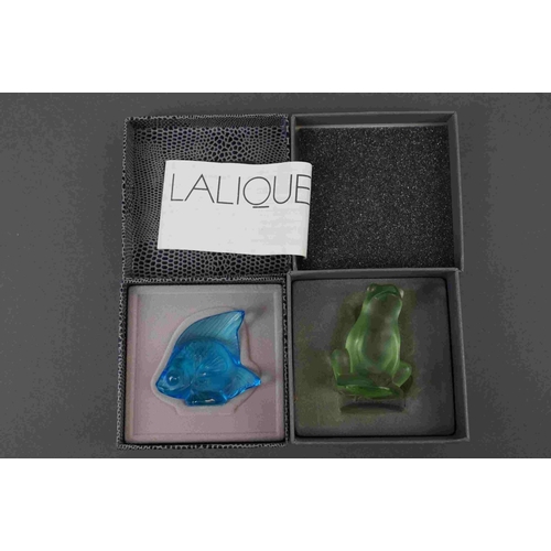 219 - Two boxed Lalique glass ornaments to include a fish and a frog.