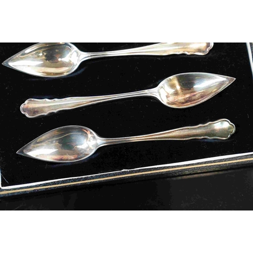 220 - A cased set of six silver plated Melon spoons.