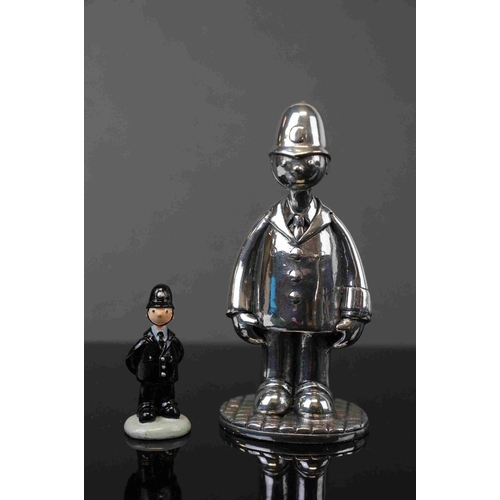 239 - A group of collectables to include a Camberwick Green pewter P.C. McGarry, a police call box and a s... 