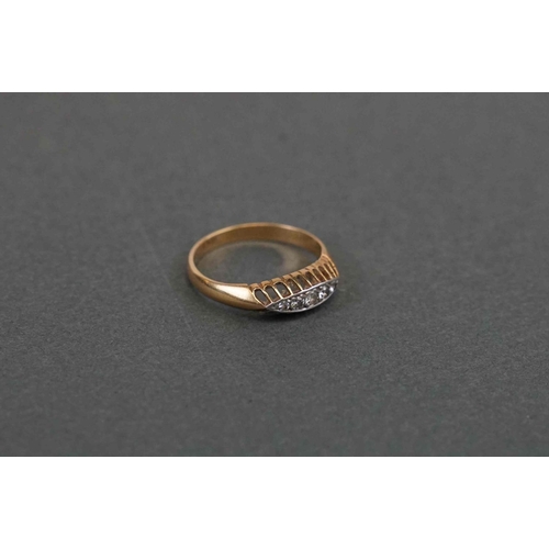 259 - 18ct gold & five diamond dress ring