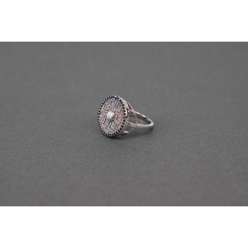 263 - Silver & CZ dress ring, set with central opal