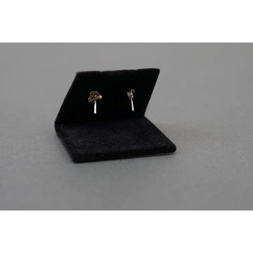 264 - Pair of silver and enamel stud earrings