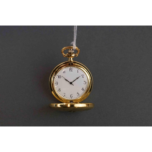 271 - Gilt full hunter pocket watch, embossed with a cricketer design to front