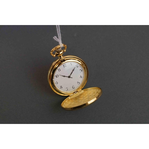 271 - Gilt full hunter pocket watch, embossed with a cricketer design to front