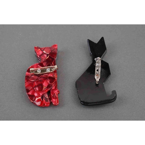 279 - Two Lea Stein style cat brooches.