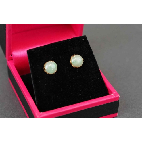 290 - Pair of yellow gold opal stud earrings